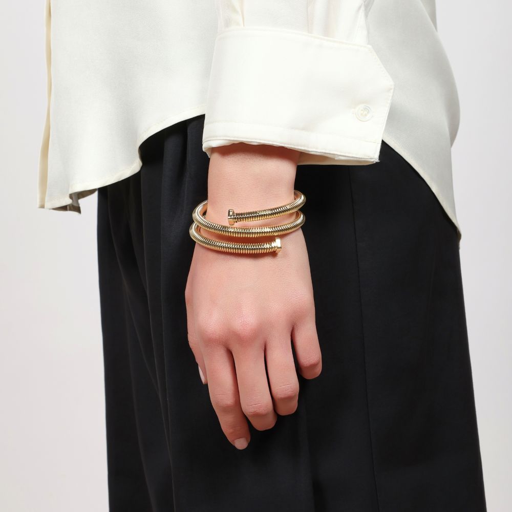 Bracciale Unoaerre Tubogas tre giri dorato